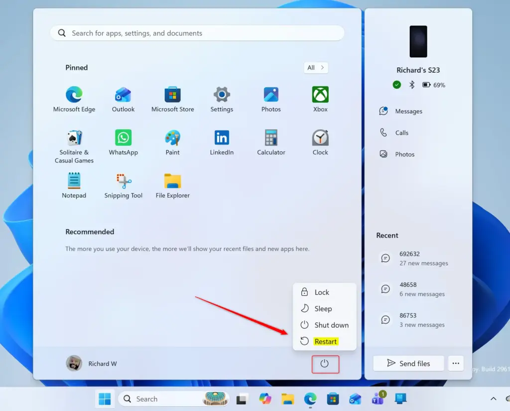 Windows 11 power menu with restart option highlighted for removal.
