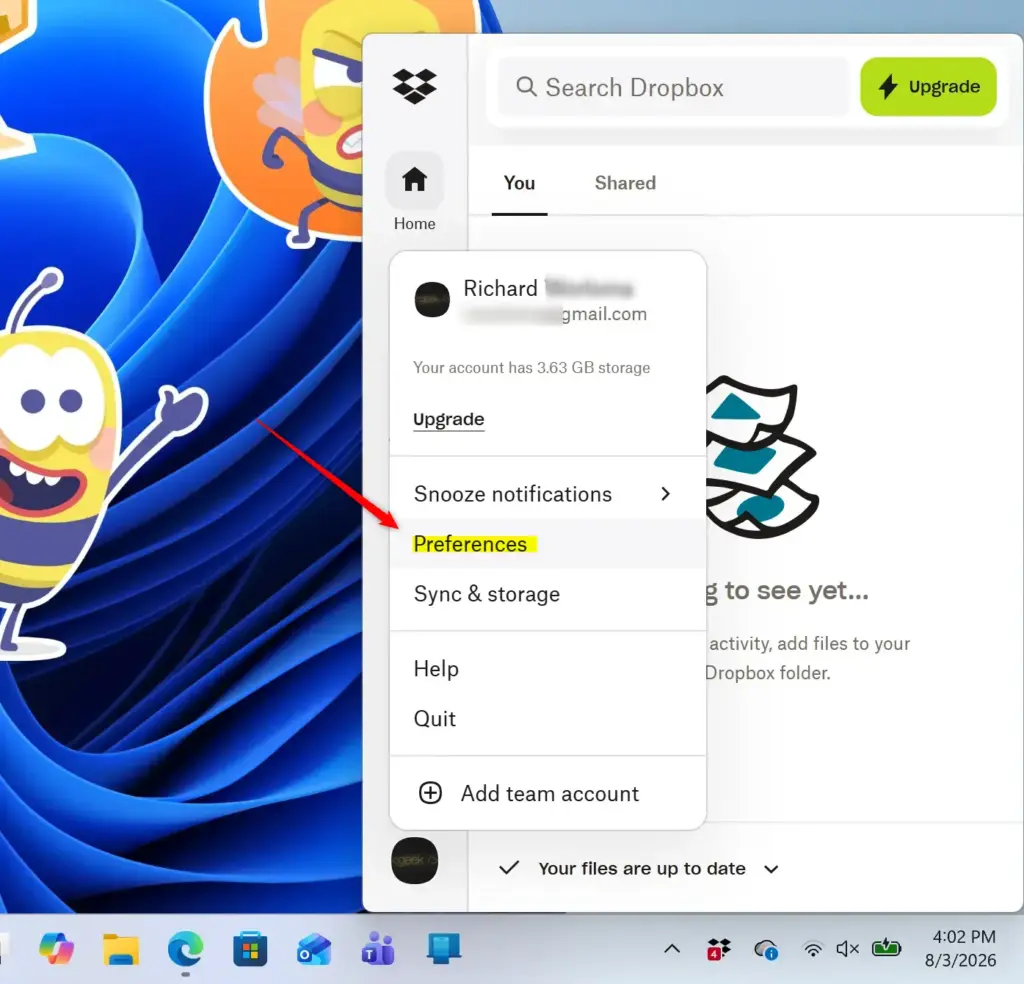 Dropbox preferences menu open, showing general settings.