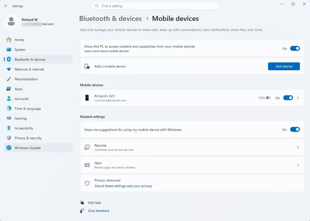Windows 11 settings showing 'Show me suggestions for using my mobile device' option.