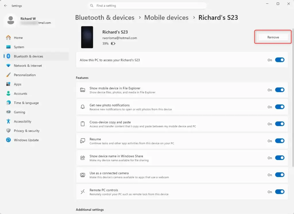 Removing a mobile device from the Phone Link app settings.