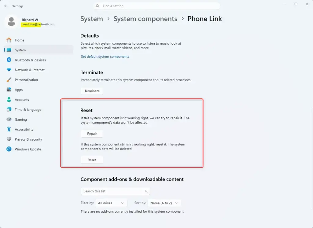 Reset option highlighted for the Phone Link app in system components.