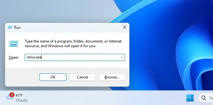 Open System Restore window from Windows 11 search bar.