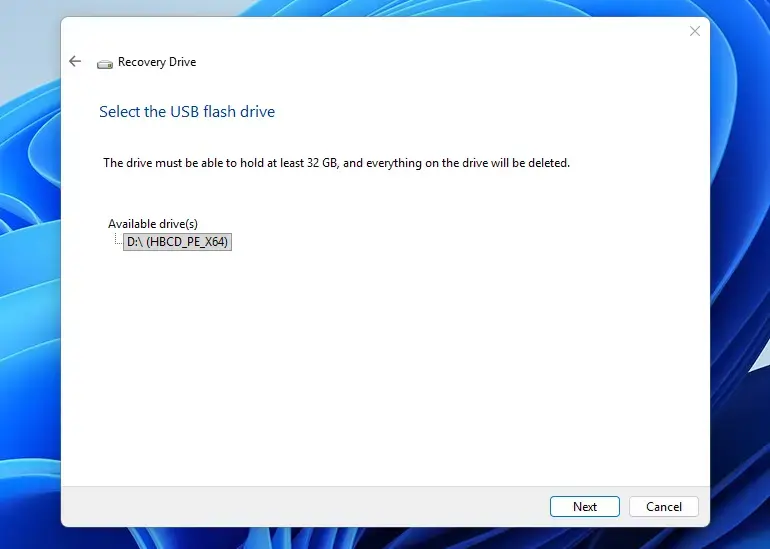 Selecting the USB flash drive for Windows 11 recovery.
