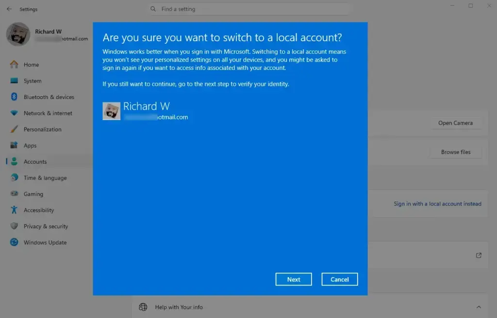 Confirming the switch to a local account in Windows 11 settings.