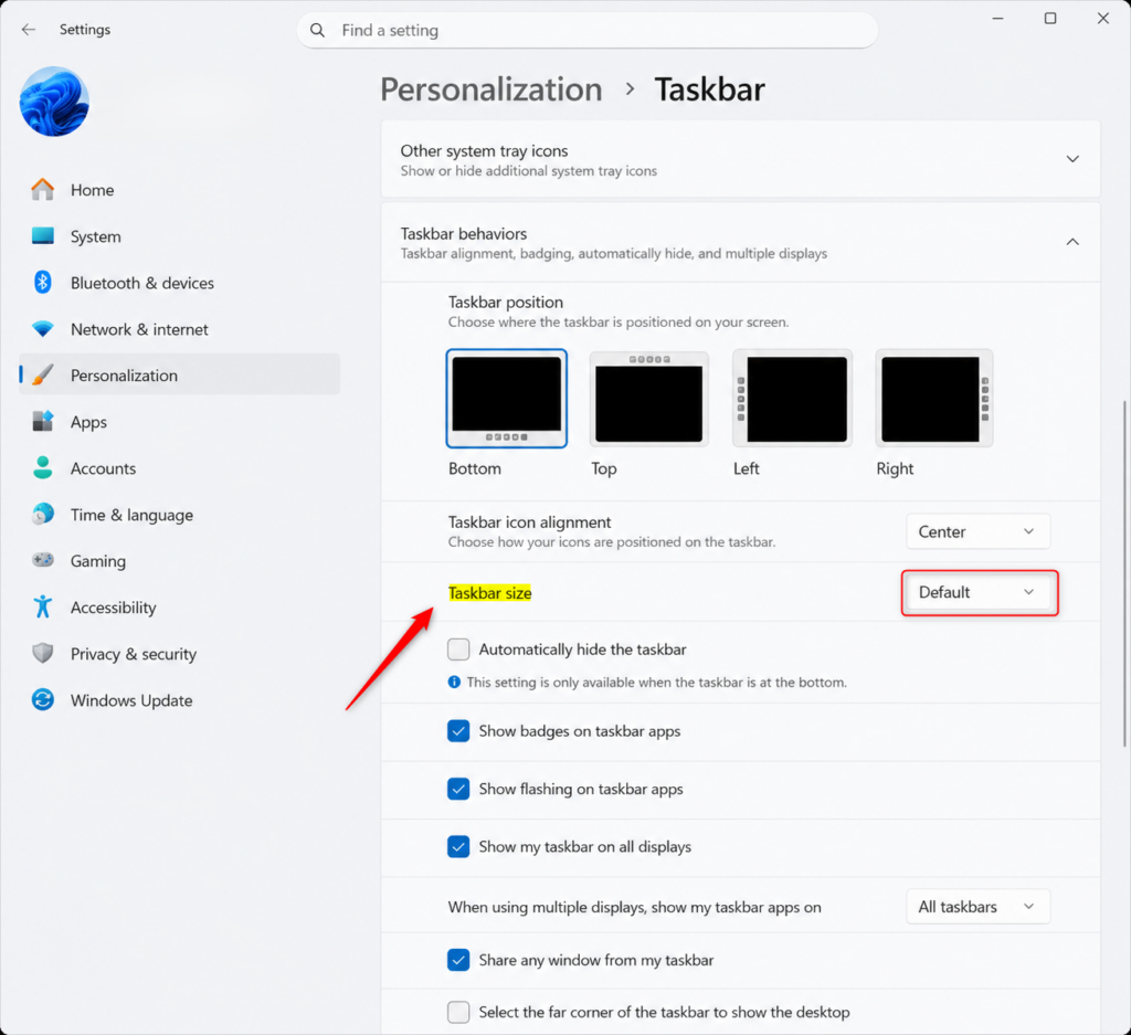 Windows 11 taskbar size option in Settings app dropdown menu.