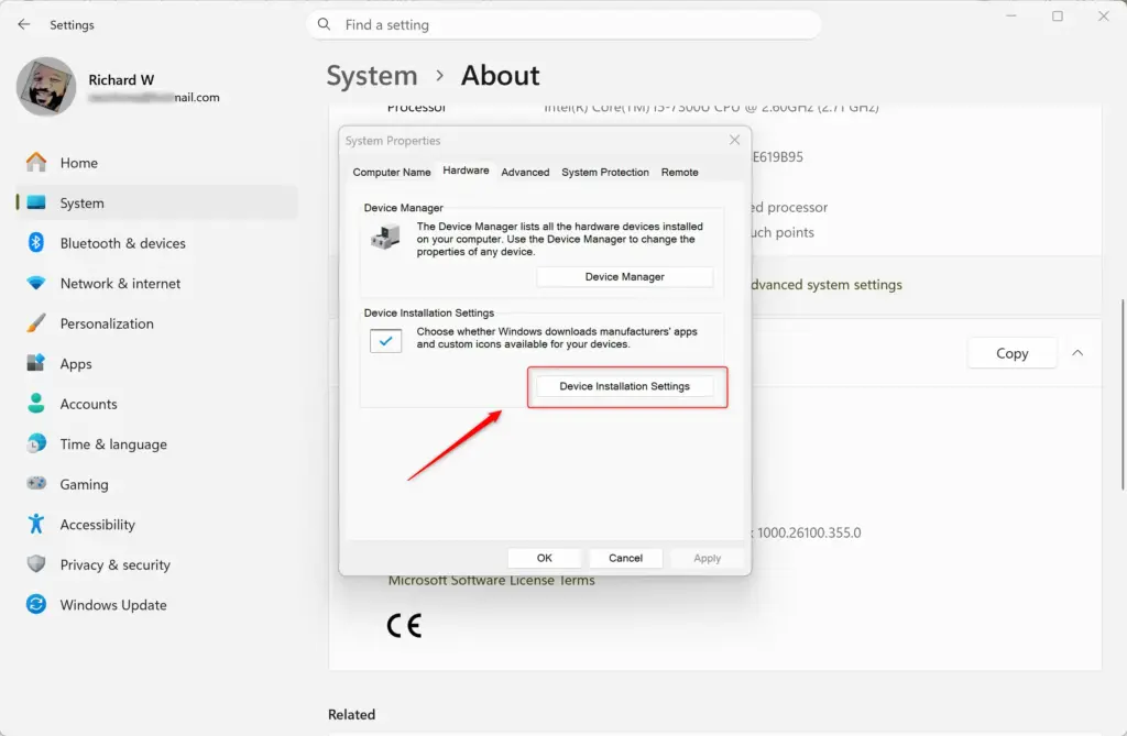 Click the 'Device installation settings' button in System Properties.