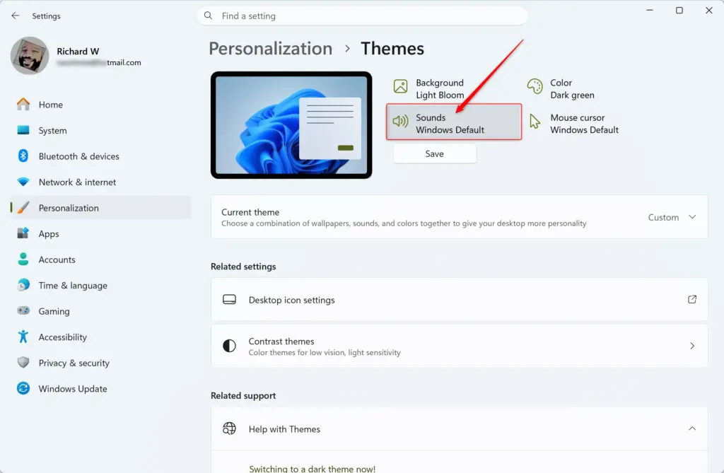 Windows 11 Themes settings showing the Sound control panel.
