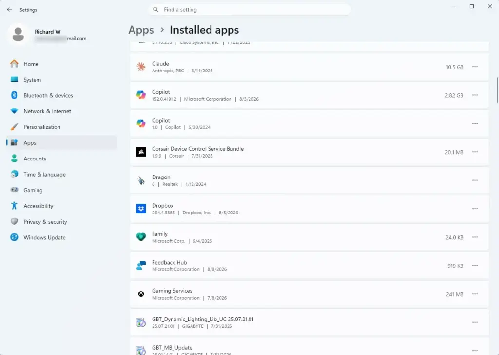 Windows 11 installed apps list in Settings for managing background app permissions.