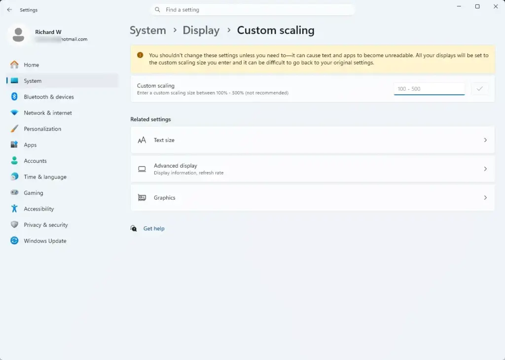 Settings › System › Display › Scale
